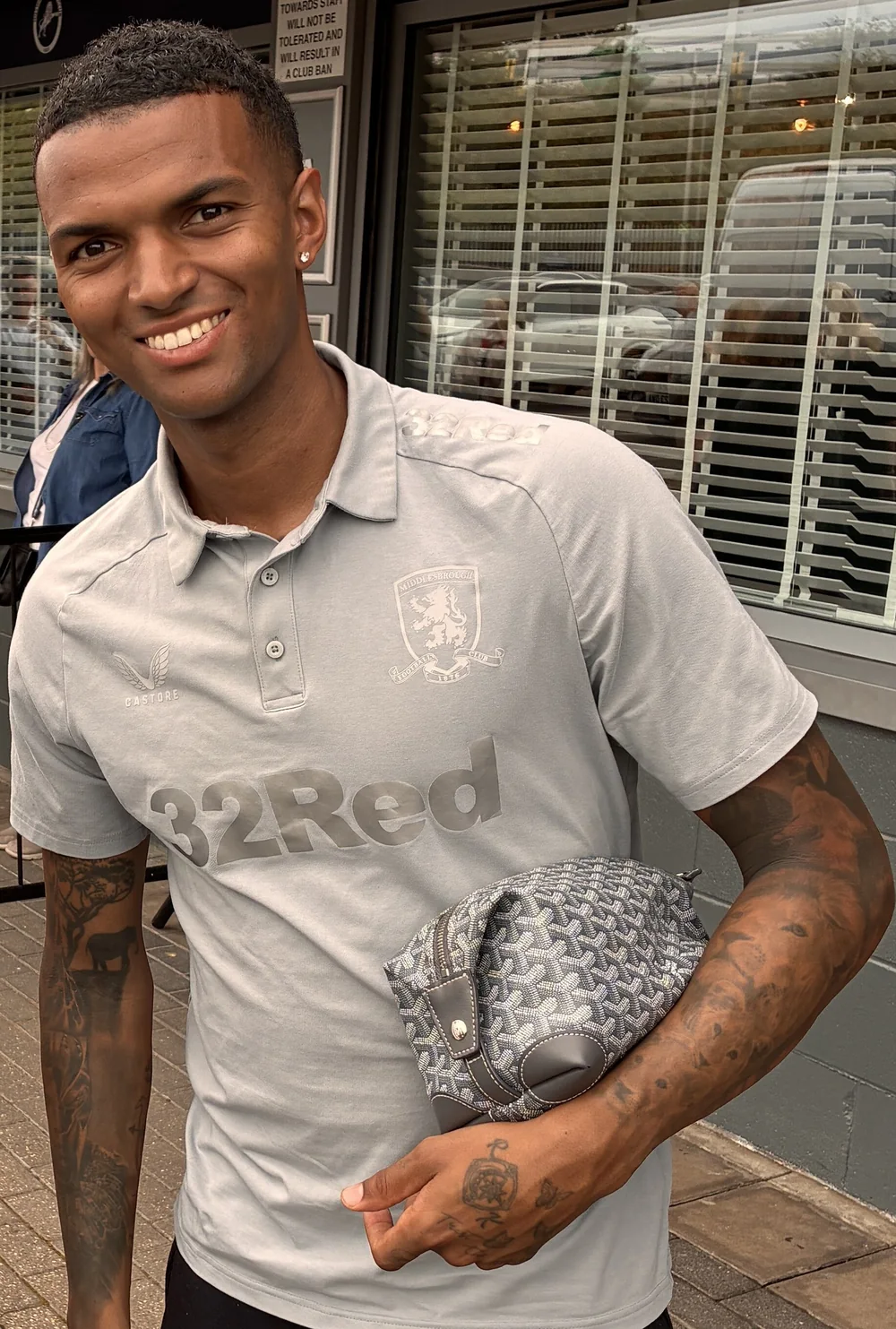 Morgan Whittaker smiling in Middlesbrough training wear after a match.