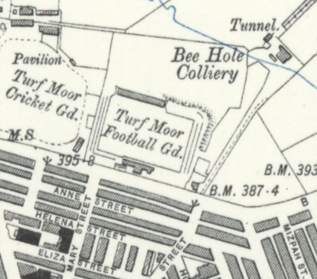 A 1913 Ordnance Survey map labelled Turf Moor Football Ground beside Turf Moor Cricket Ground.